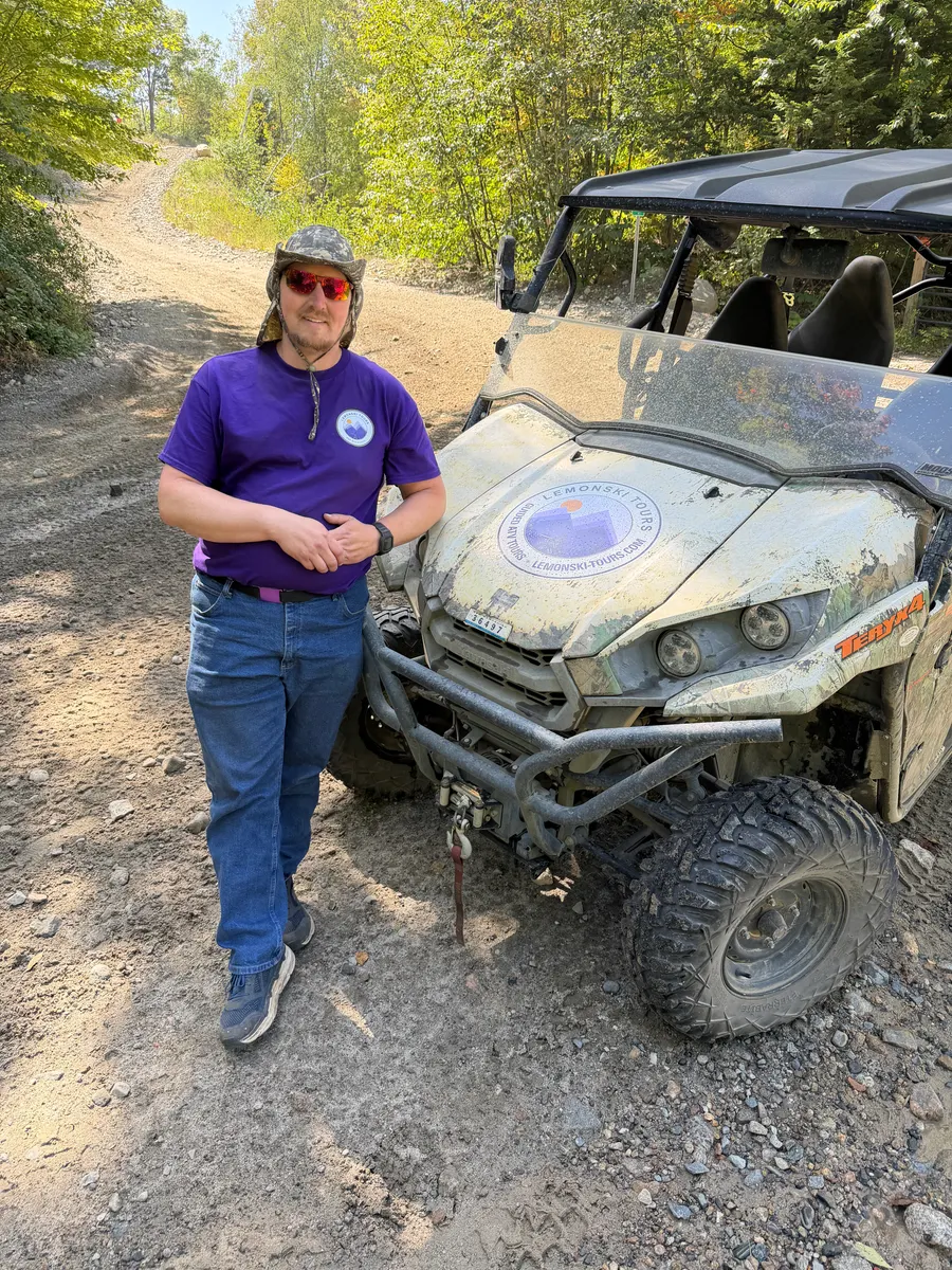 James 'Jay' Leeman standing beside his branded Lemonski Tours buggy on a North Country trail